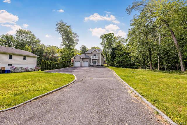 1 Kewanee Road New Rochelle, NY 10804 - Photo 30 of 36 a view of a house with a yard