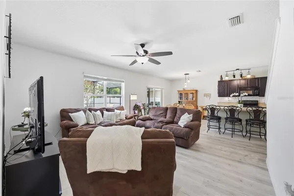 a view of livingroom with furniture and wooden floor