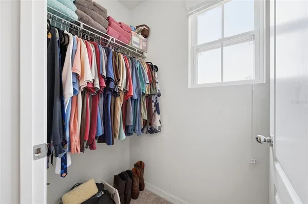 a bathroom with a toilet and a bathtub