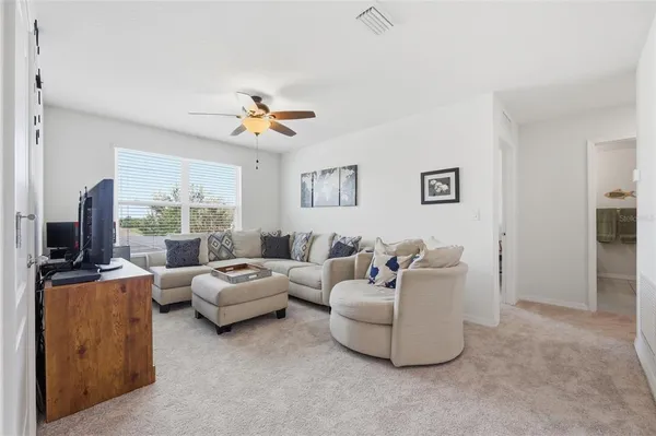 a view of a swimming pool with a lounge chairs