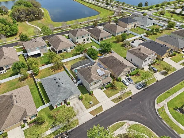 an aerial view of residential house with outdoor space