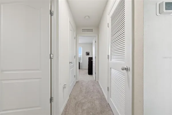 an aerial view of residential house with outdoor space and swimming pool