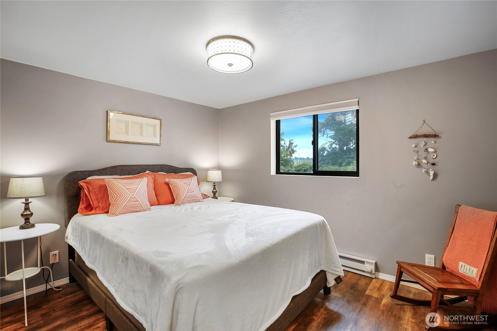 1968 State Route 105 Aberdeen, WA 98520 - Photo 13 of 39 a bedroom with a bed and a window