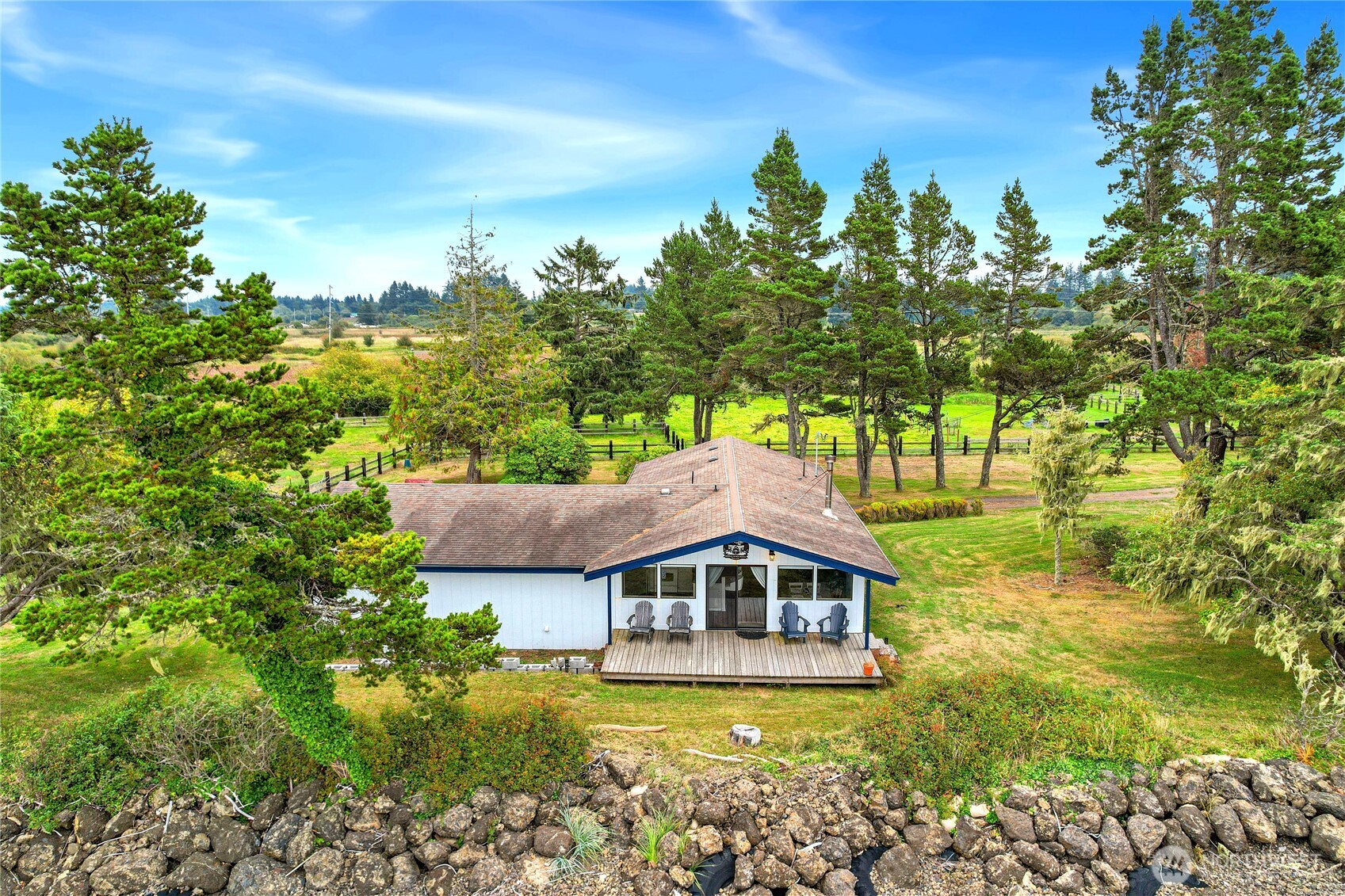 1968 State Route 105 Aberdeen, WA 98520 - Photo 2 of 39 a front view of a house with a yard