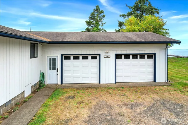 a house with trees in front of it