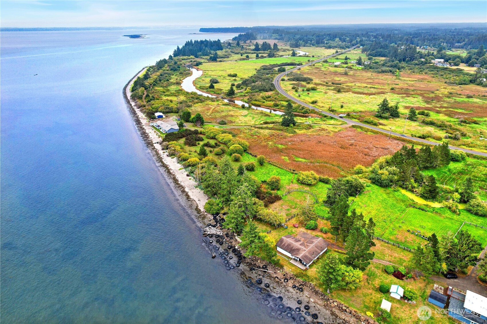 1968 State Route 105 Aberdeen, WA 98520 - Photo 35 of 39 a view of a swimming pool with a yard