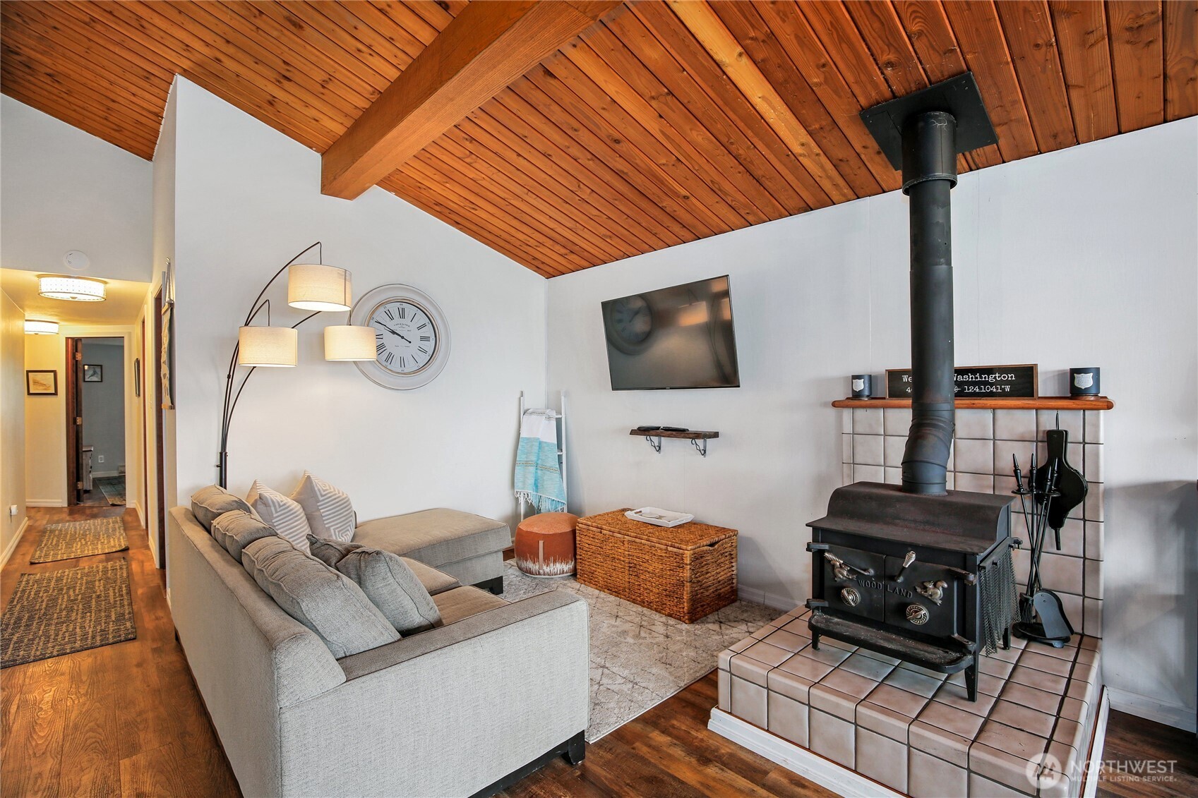 1968 State Route 105 Aberdeen, WA 98520 - Photo 5 of 39 a living room with furniture and a flat screen tv