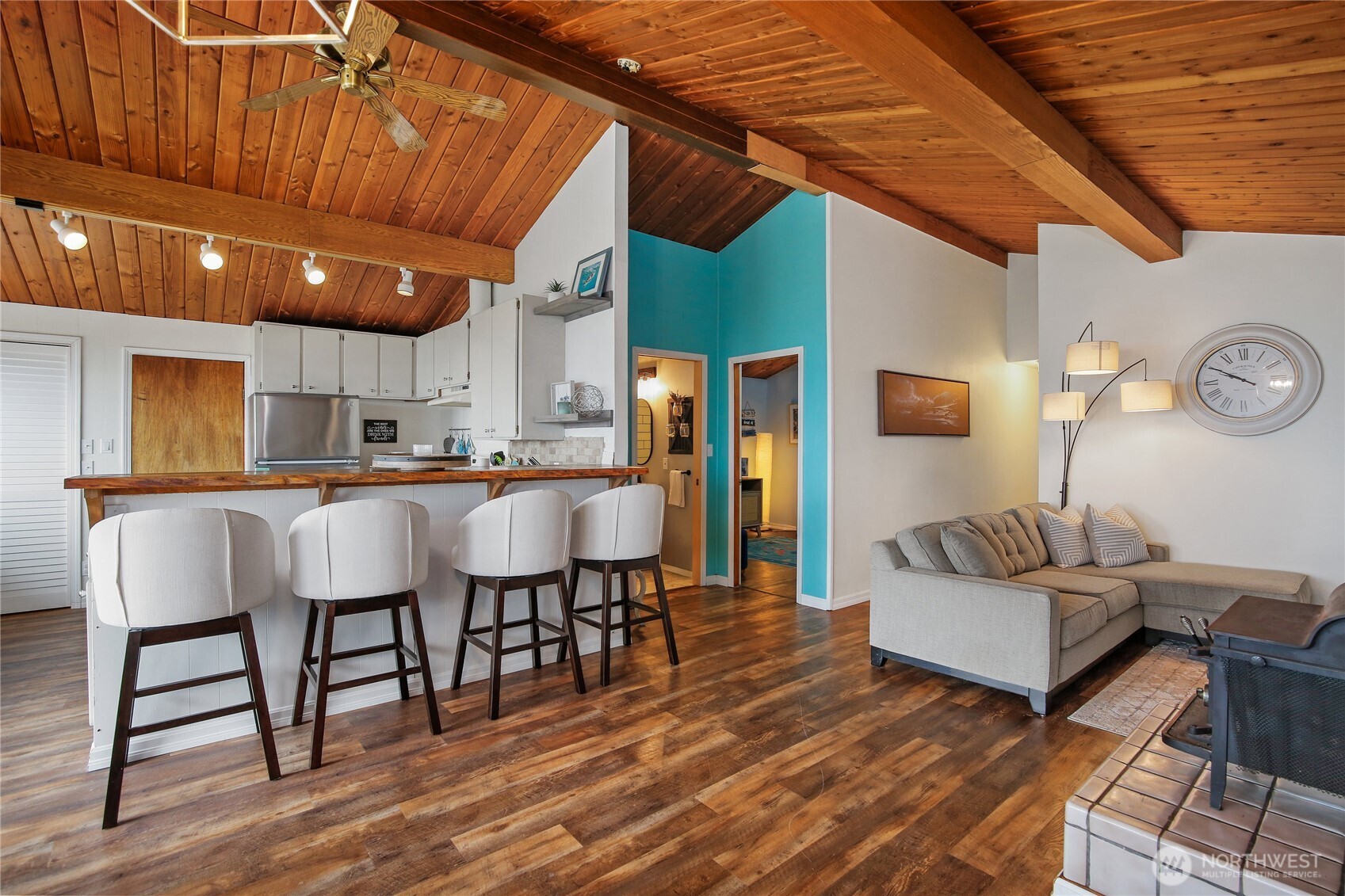 1968 State Route 105 Aberdeen, WA 98520 - Photo 8 of 39 a living room with stainless steel appliances kitchen island granite countertop furniture and a wooden floors