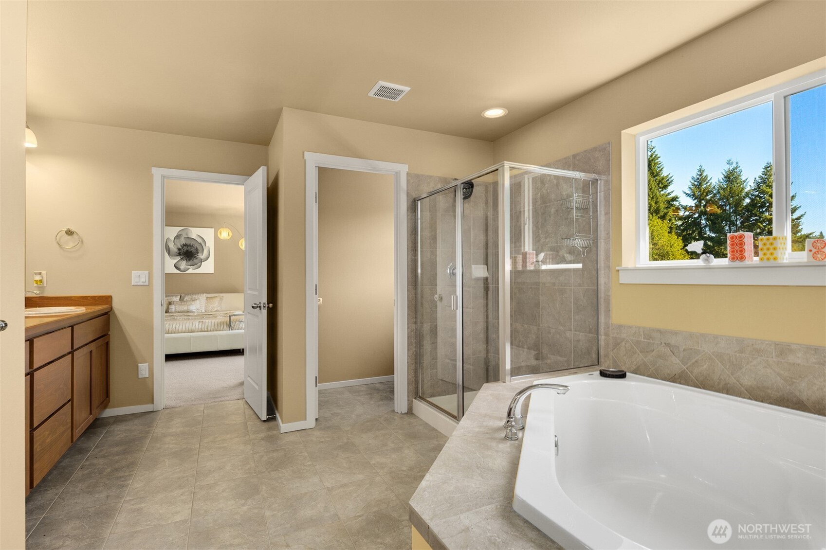 3532 217th Place Southeast Bothell, WA 98021 - Photo 19 of 38 a bathroom with a tub sink and mirror