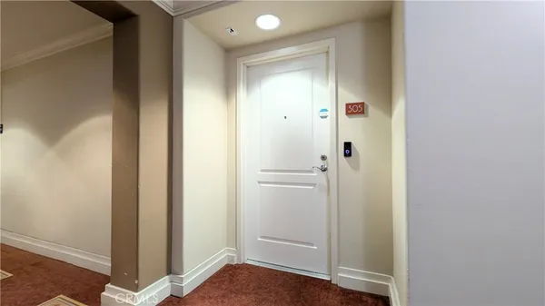 a view of a bathroom with wooden floor