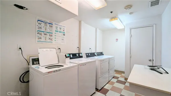 a room with a stove and a table