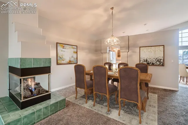 a view of a dining room with furniture