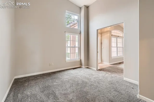 an empty room with windows