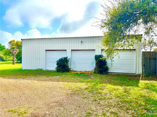 a living room with furniture fireplace and a flat screen tv