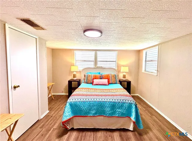 a view of living room with furniture and flat screen tv
