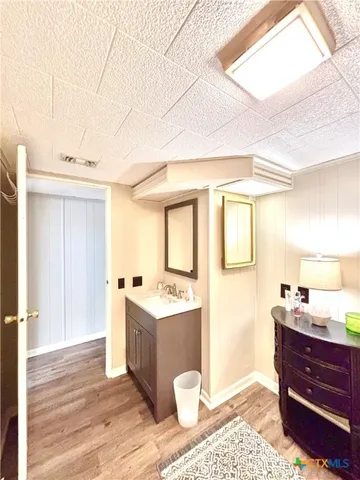 a bathroom with a sink and tub