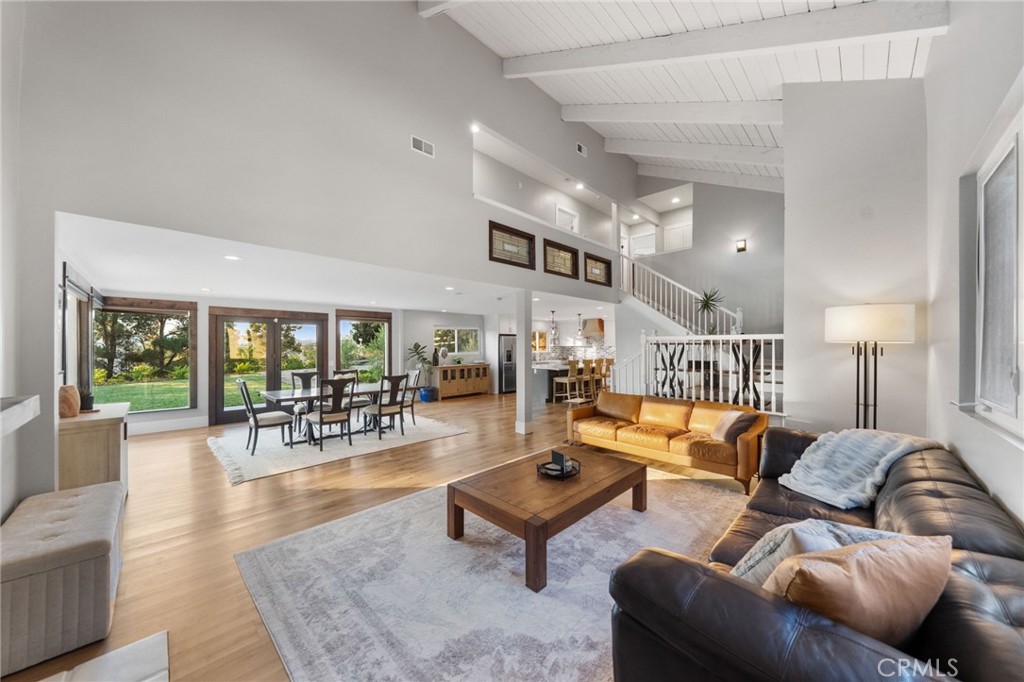 40221 Paseo Sereno Temecula, CA 92591 - Photo 11 of 45 a living room with furniture and wooden floor