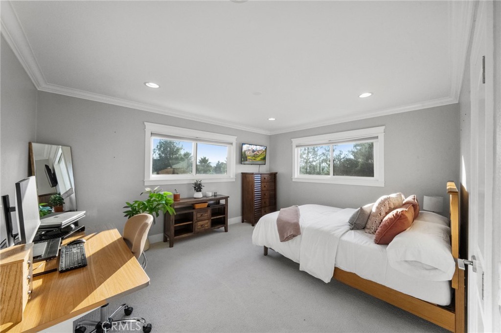 40221 Paseo Sereno Temecula, CA 92591 - Photo 25 of 45 a bedroom with furniture and a window