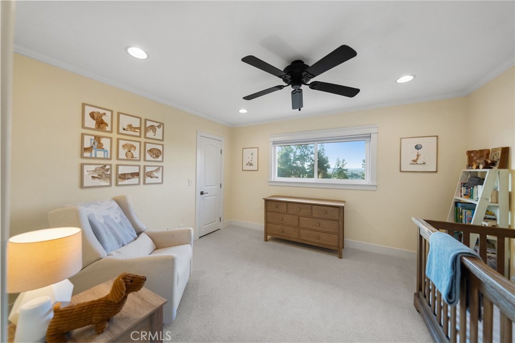 40221 Paseo Sereno Temecula, CA 92591 - Photo 27 of 45 a living room with furniture and a window