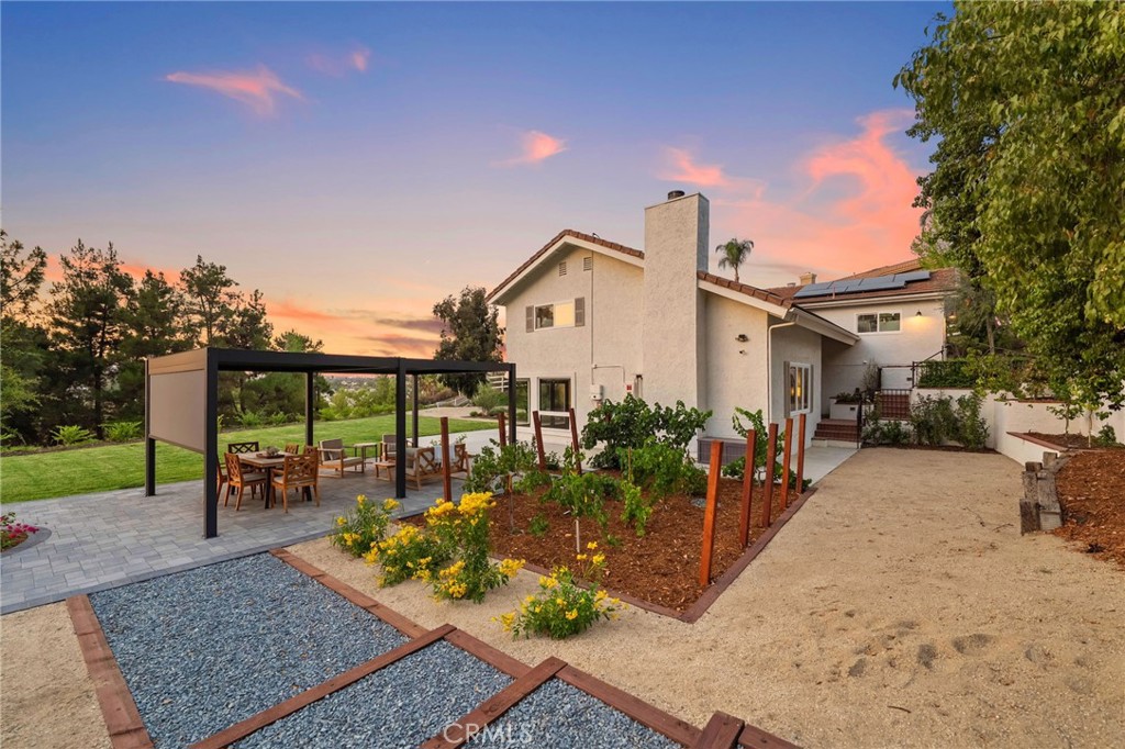 40221 Paseo Sereno Temecula, CA 92591 - Photo 31 of 45 a view of a house with backyard and sitting area