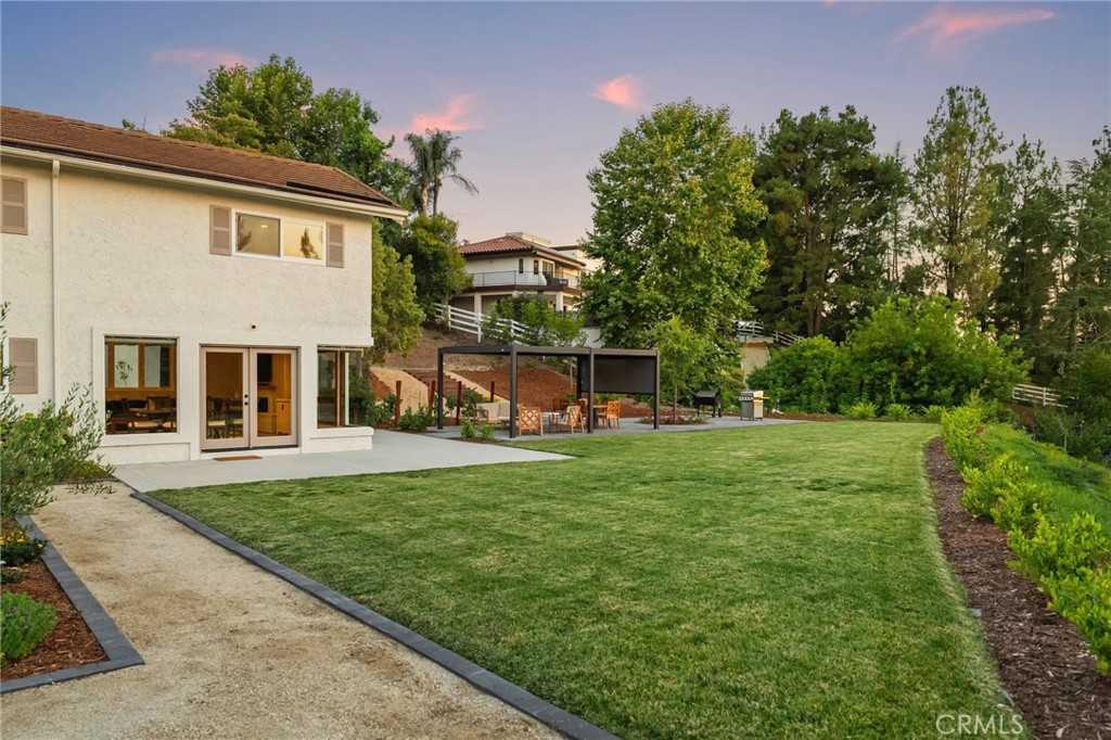 40221 Paseo Sereno Temecula, CA 92591 - Photo 33 of 45 front view of a house with a yard