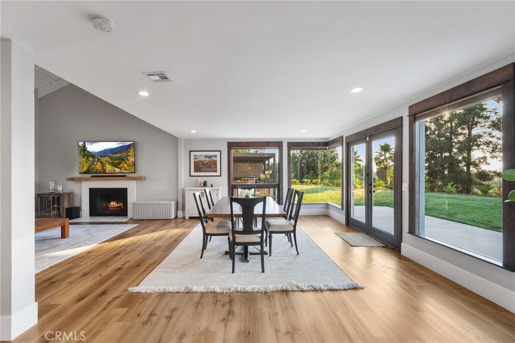 40221 Paseo Sereno Temecula, CA 92591 - Photo 5 of 45 a living room with fireplace furniture and a large window