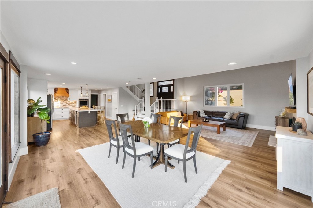 40221 Paseo Sereno Temecula, CA 92591 - Photo 6 of 45 a view of a dining room with furniture window and wooden floor