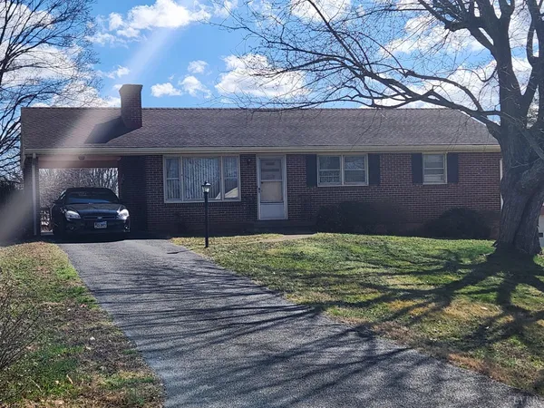 a house view with a backyard space