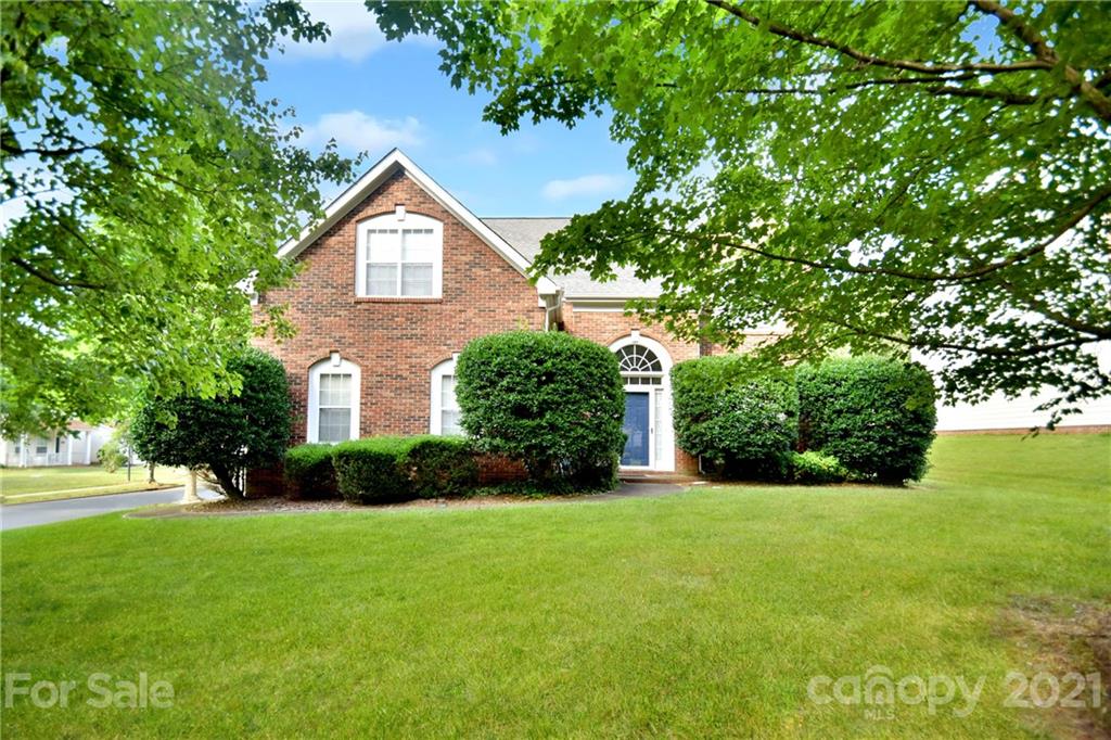 3407 Brownes Ferry Road Charlotte, NC 28269 - Photo 2 of 24 a house view with garden space and trees