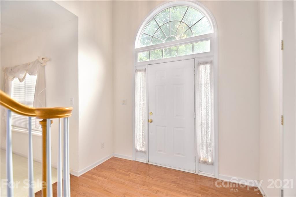 3407 Brownes Ferry Road Charlotte, NC 28269 - Photo 3 of 24 a view of front door with a mirror