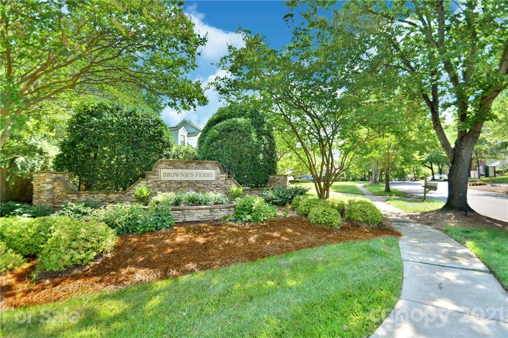 3407 Brownes Ferry Road Charlotte, NC 28269 - Photo 21 of 24 a view of a yard with plants and trees