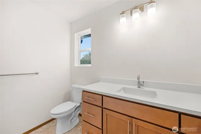 a bathroom with a sink and a toilet