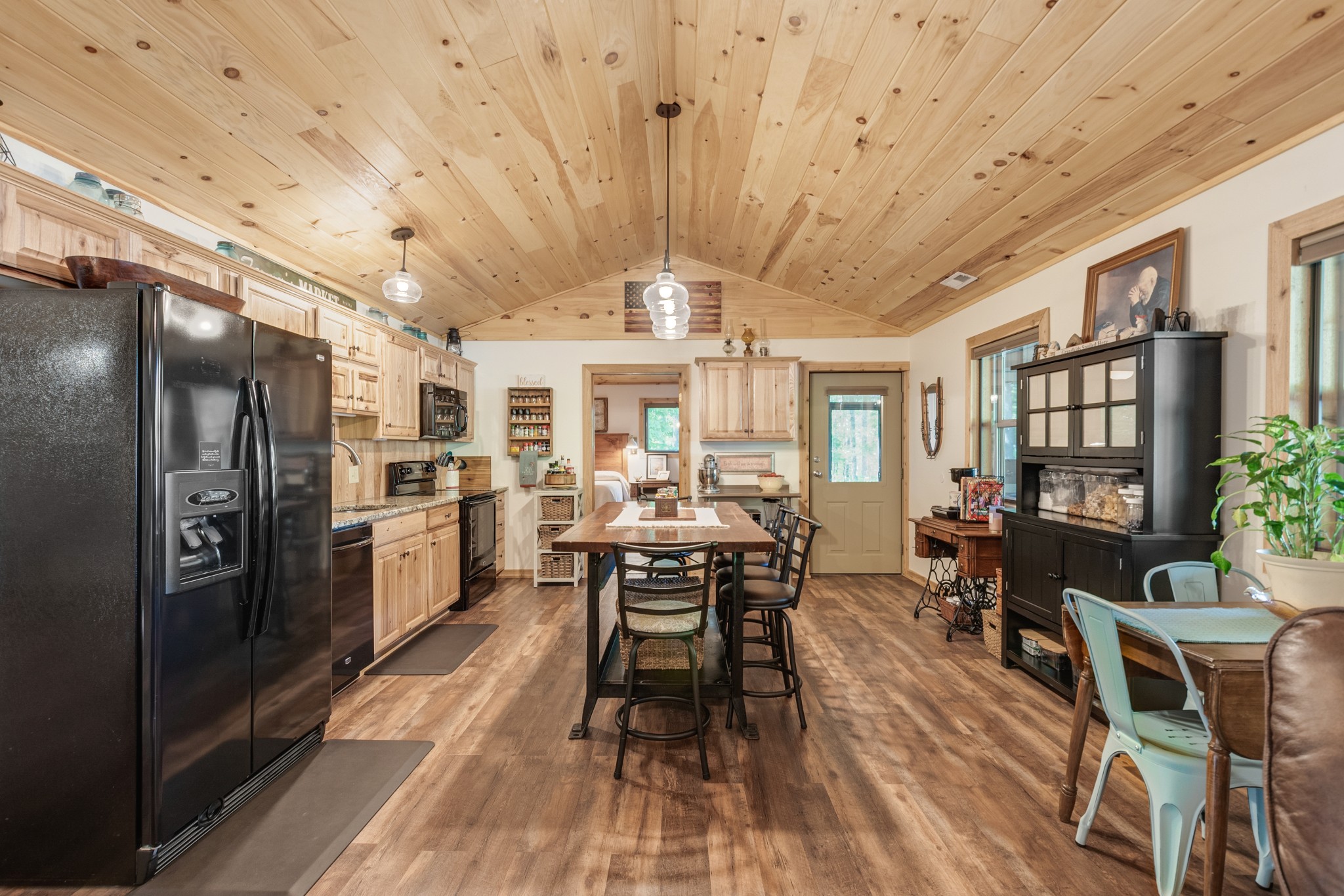 6089 Norman Thomas Road Silver Point, TN 38582 - Photo 13 of 37 a view of a dining room with furniture window and wooden floor