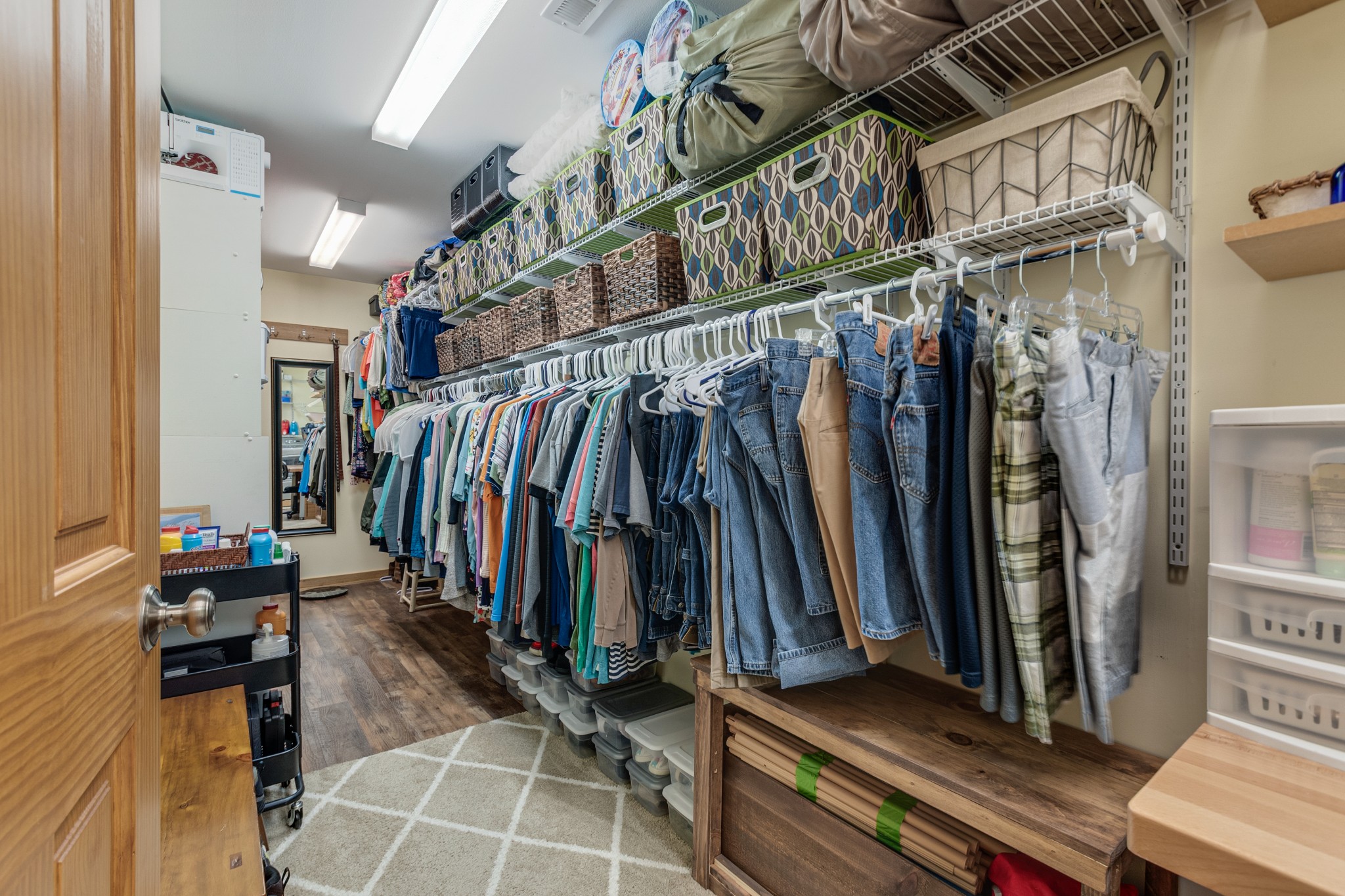 6089 Norman Thomas Road Silver Point, TN 38582 - Photo 19 of 37 a view of walk in closet with clothes and shoes