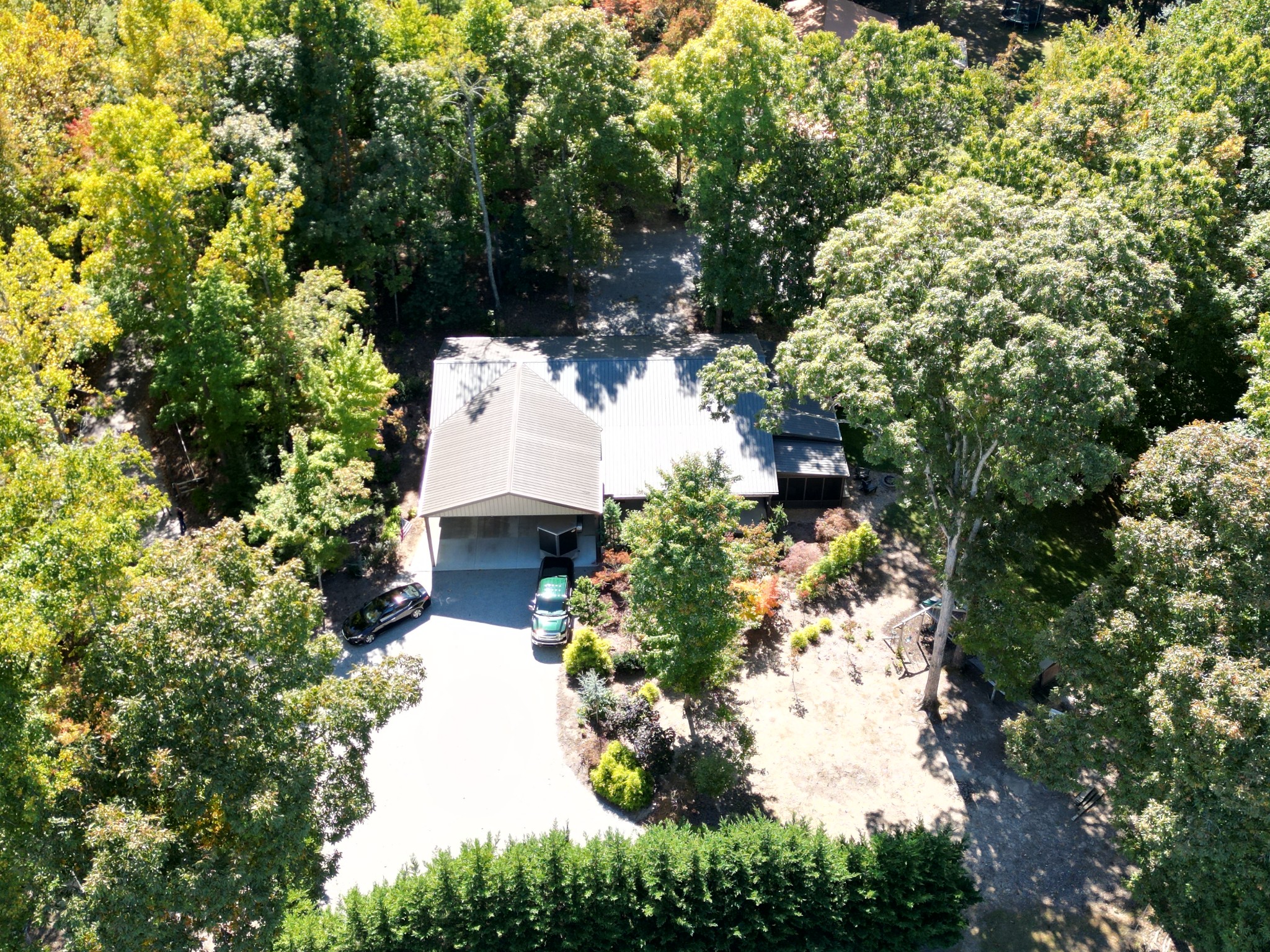 6089 Norman Thomas Road Silver Point, TN 38582 - Photo 2 of 37 aerial view of a house with a yard and garden