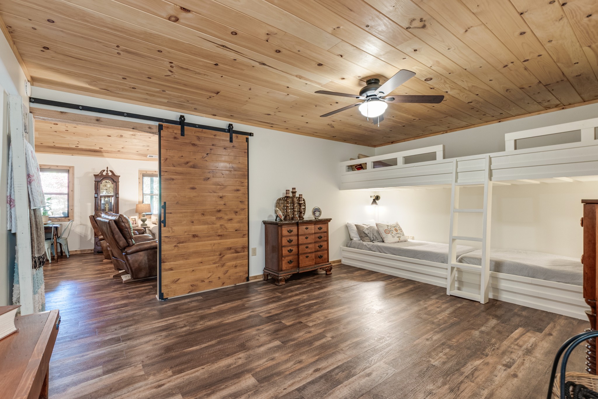 6089 Norman Thomas Road Silver Point, TN 38582 - Photo 22 of 37 a hallway with wooden cabinets and furniture