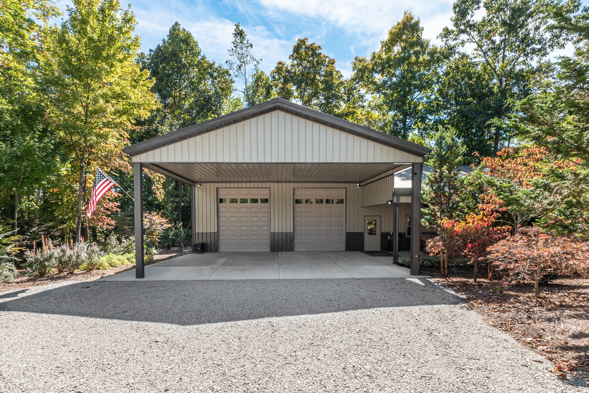 6089 Norman Thomas Road Silver Point, TN 38582 - Photo 25 of 37 a view of a house with a yard and garage