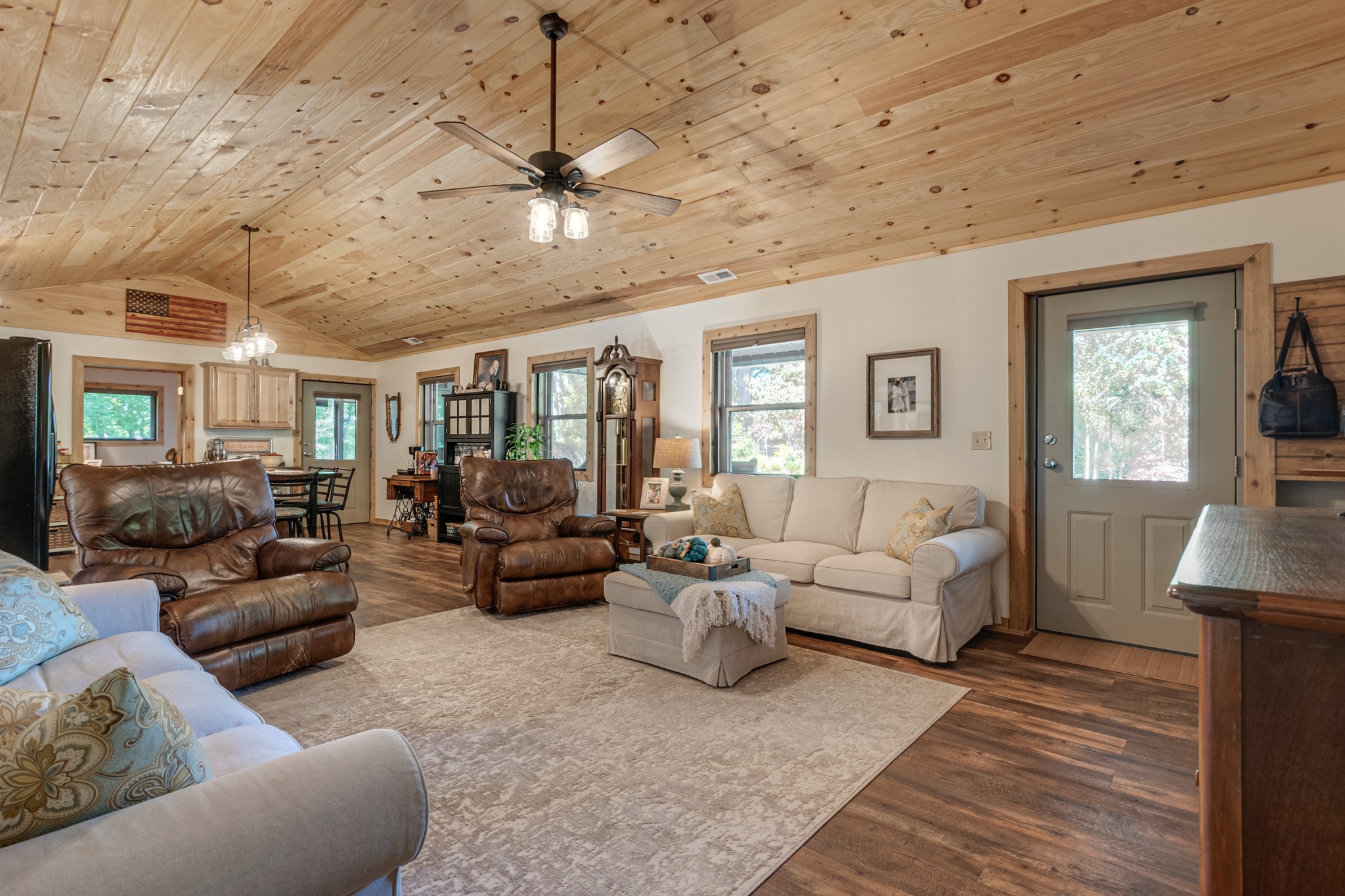 6089 Norman Thomas Road Silver Point, TN 38582 - Photo 10 of 37 a living room with furniture and a chandelier