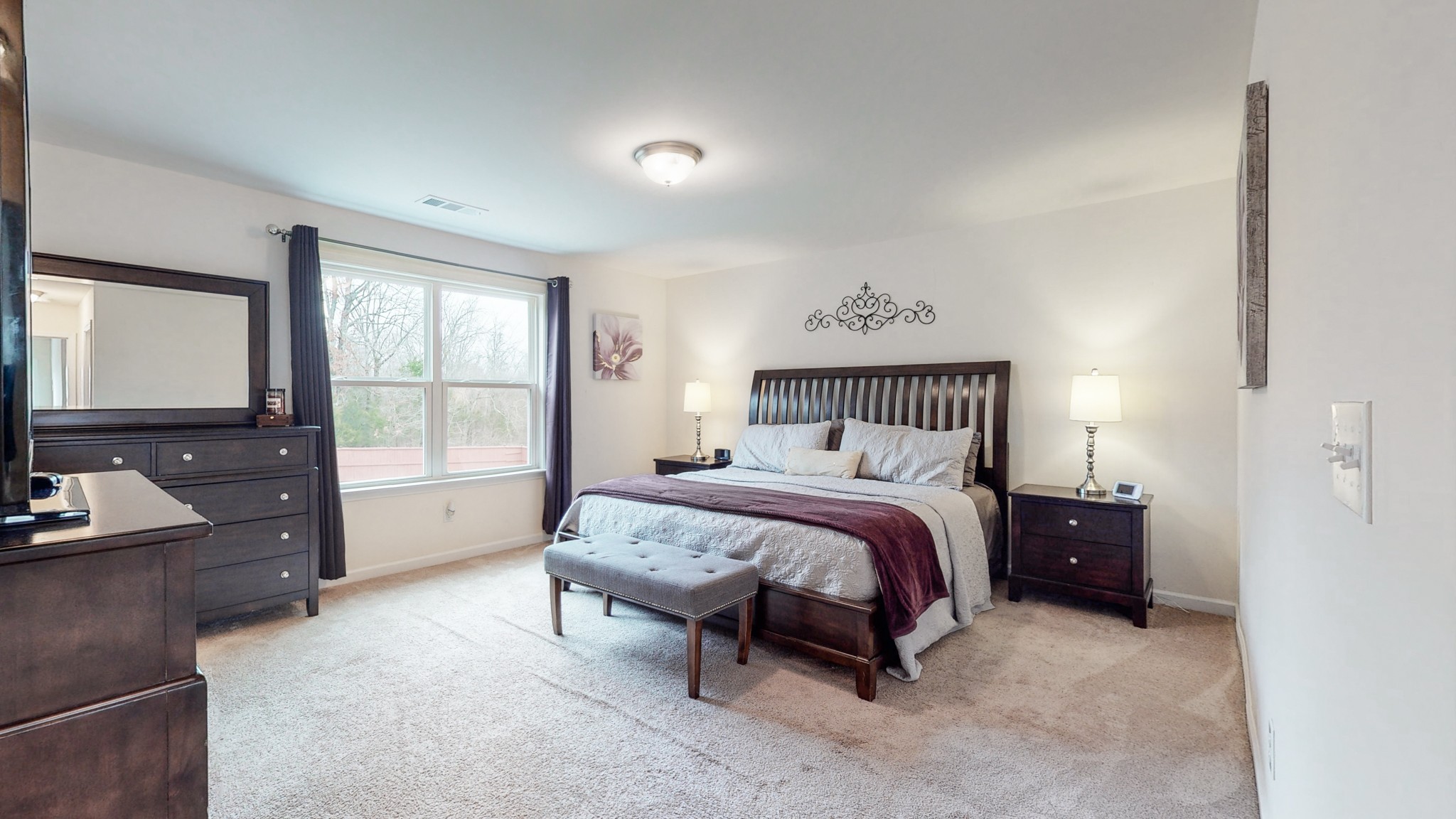 1412 Old Stone Road Lebanon, TN 37087 - Photo 14 of 18 a bedroom with a bed and a flat screen tv