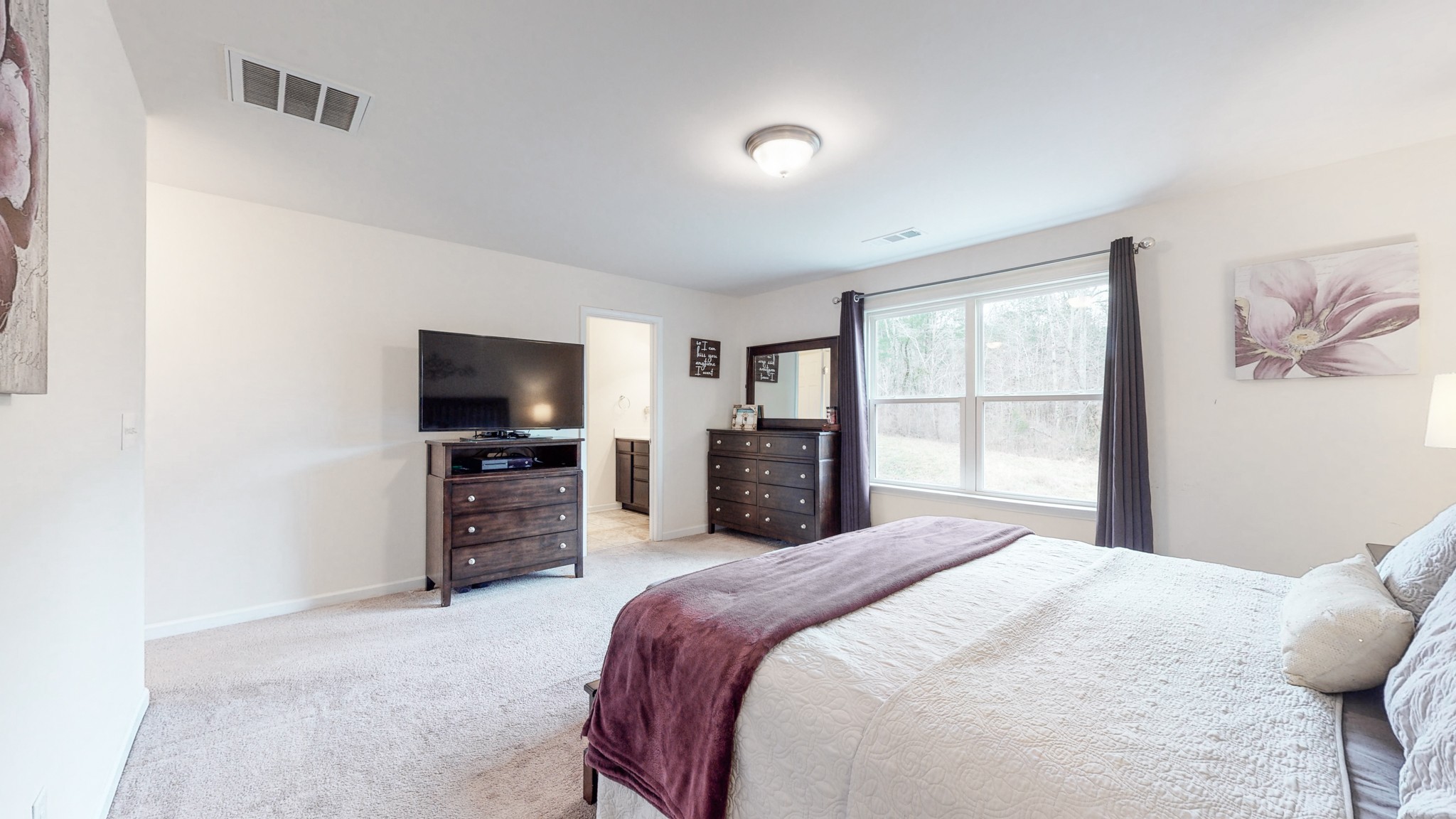 1412 Old Stone Road Lebanon, TN 37087 - Photo 15 of 18 a bedroom with a bed and a television