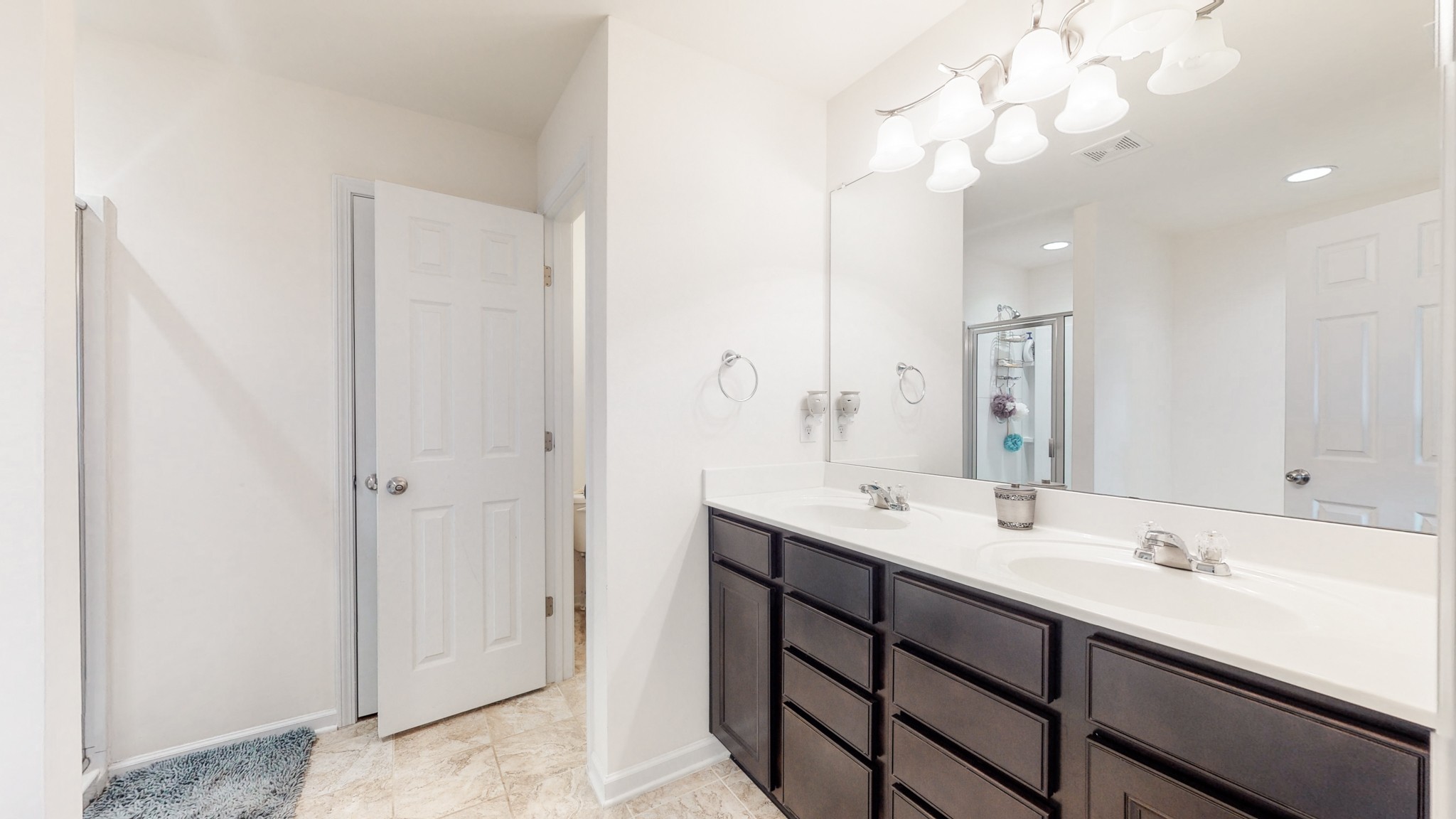 1412 Old Stone Road Lebanon, TN 37087 - Photo 16 of 18 a bathroom with a double vanity sink mirror and