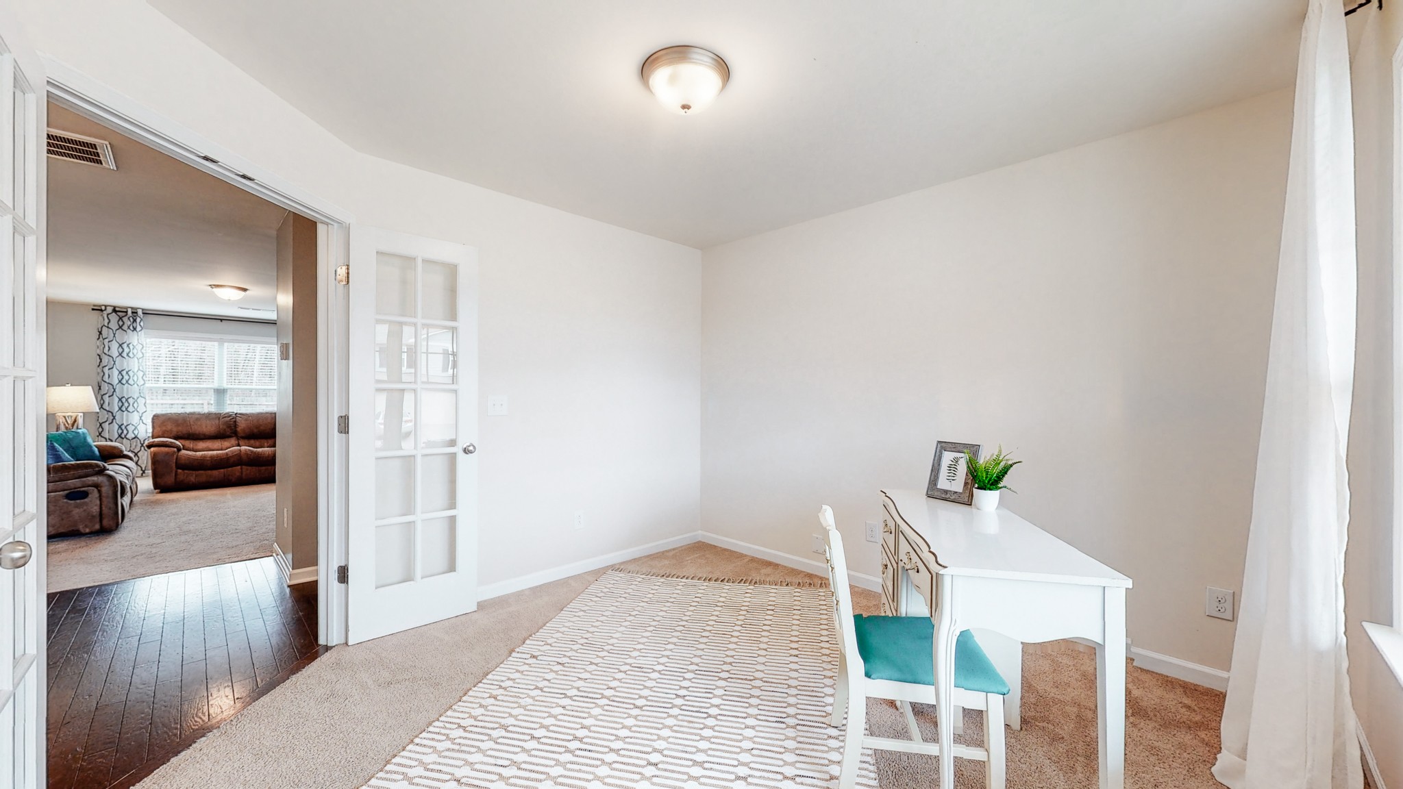 1412 Old Stone Road Lebanon, TN 37087 - Photo 4 of 18 a bedroom with furniture and a wooden floor