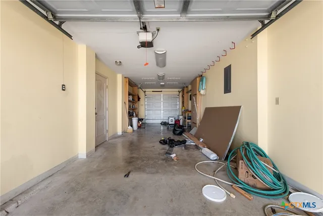 a view of a livingroom with furniture and a window