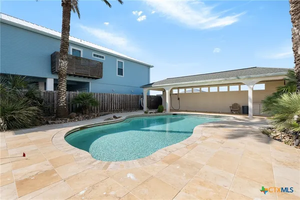 a view of a house with a swimming pool