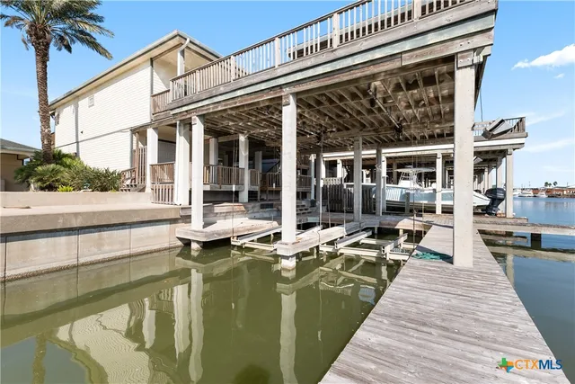 swimming pool view with a outdoor seating