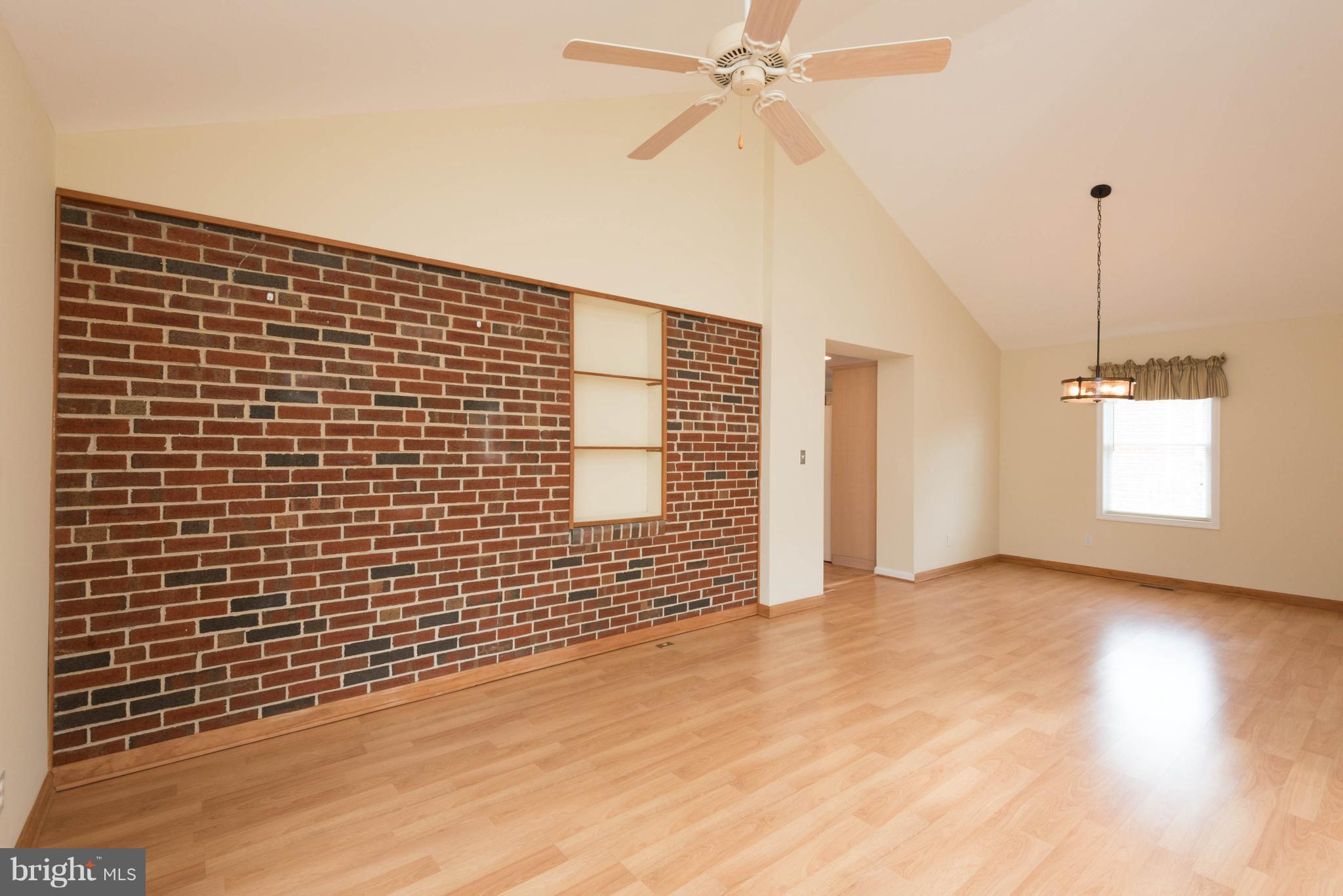 259 Harlem Road Pasadena, MD 21122 - Photo 15 of 30 Brick Wall Accent / Ceiling Fan Comfort