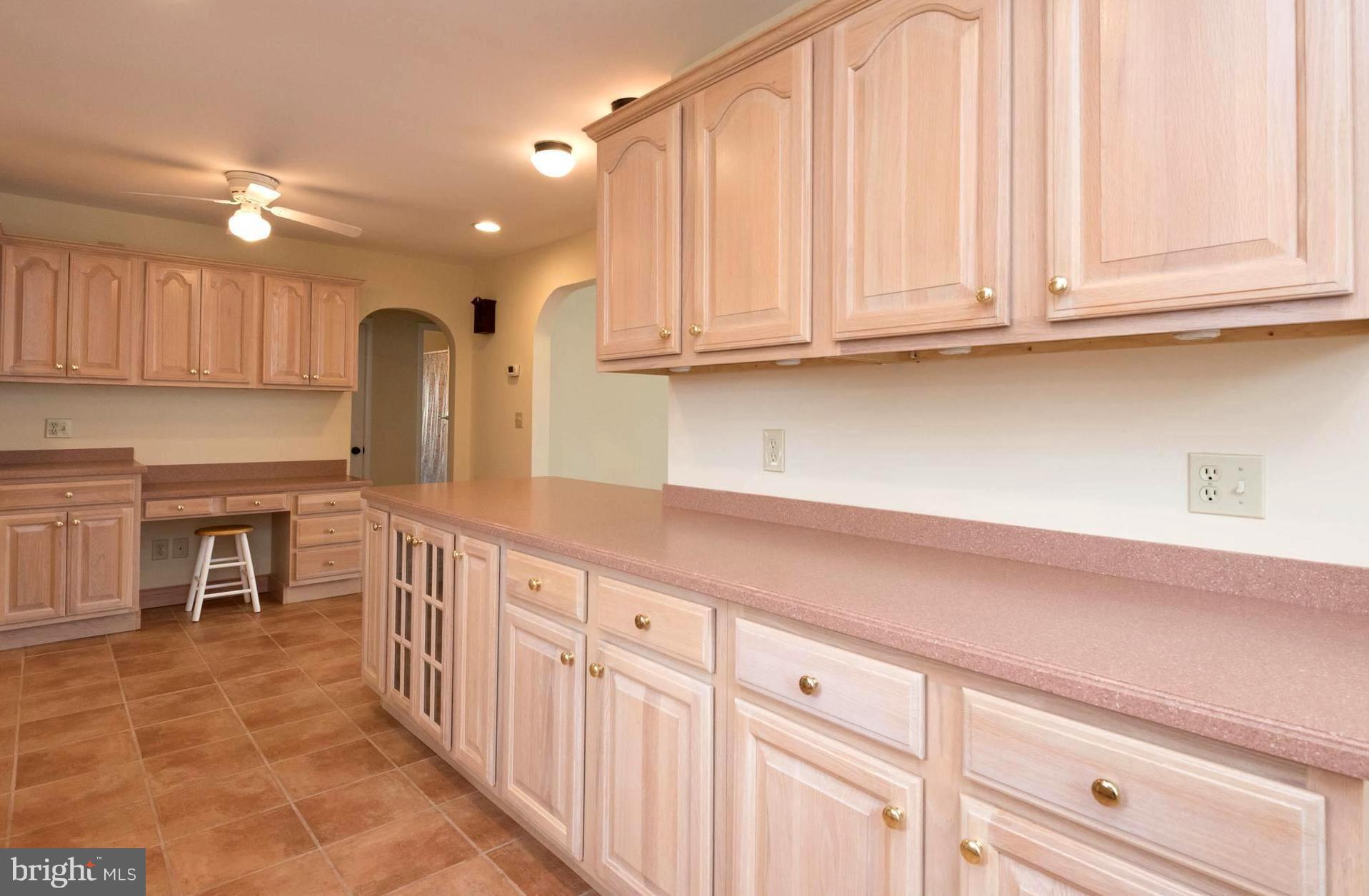 259 Harlem Road Pasadena, MD 21122 - Photo 4 of 30 Kitchen Showcasing Custom Finishes and Built-Ins