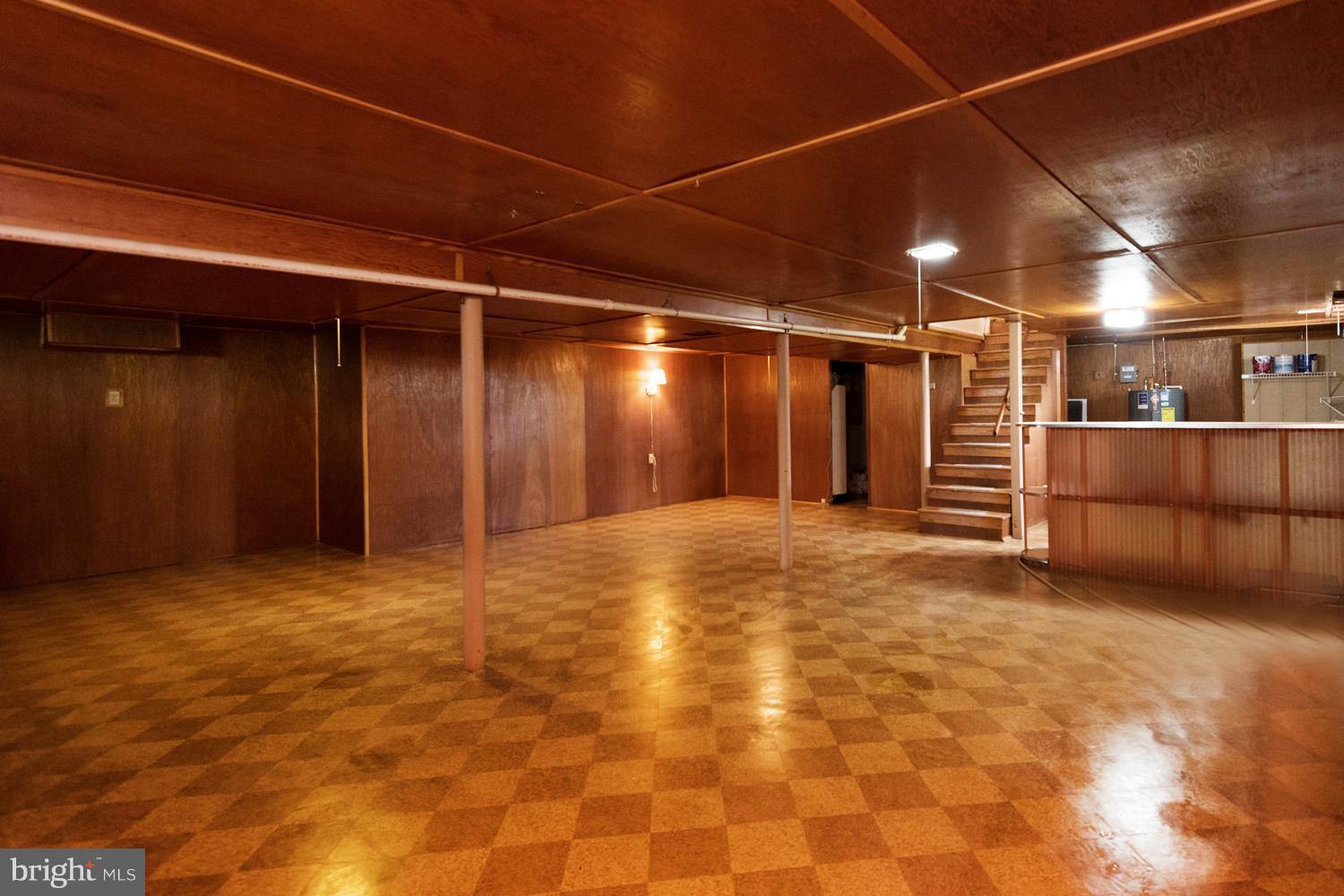259 Harlem Road Pasadena, MD 21122 - Photo 5 of 30 Expansive Lower Level Rec Room with Bar