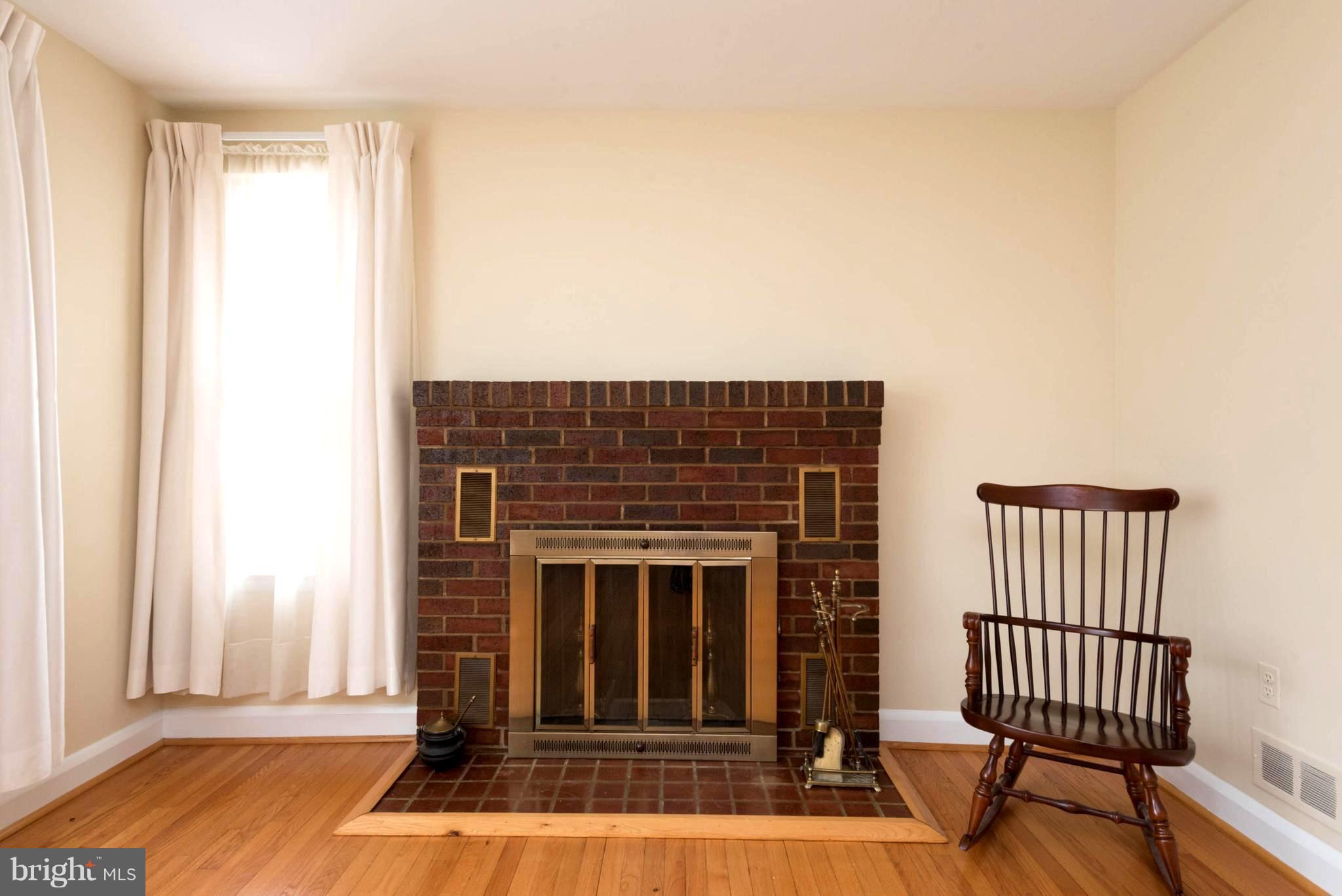 259 Harlem Road Pasadena, MD 21122 - Photo 10 of 30 Warming Brick Hearth Wood Burning Fireplace