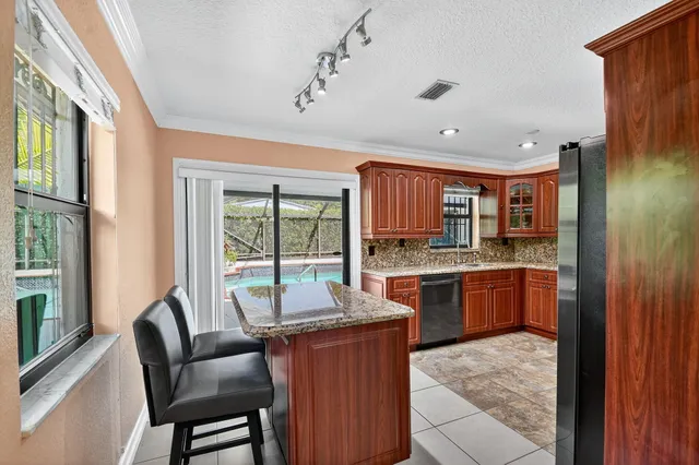 a view of a livingroom with furniture and window